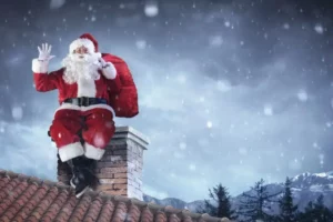 Père Noël descendant dans une cheminée entretenue d’un immeuble en copropriété à Lyon